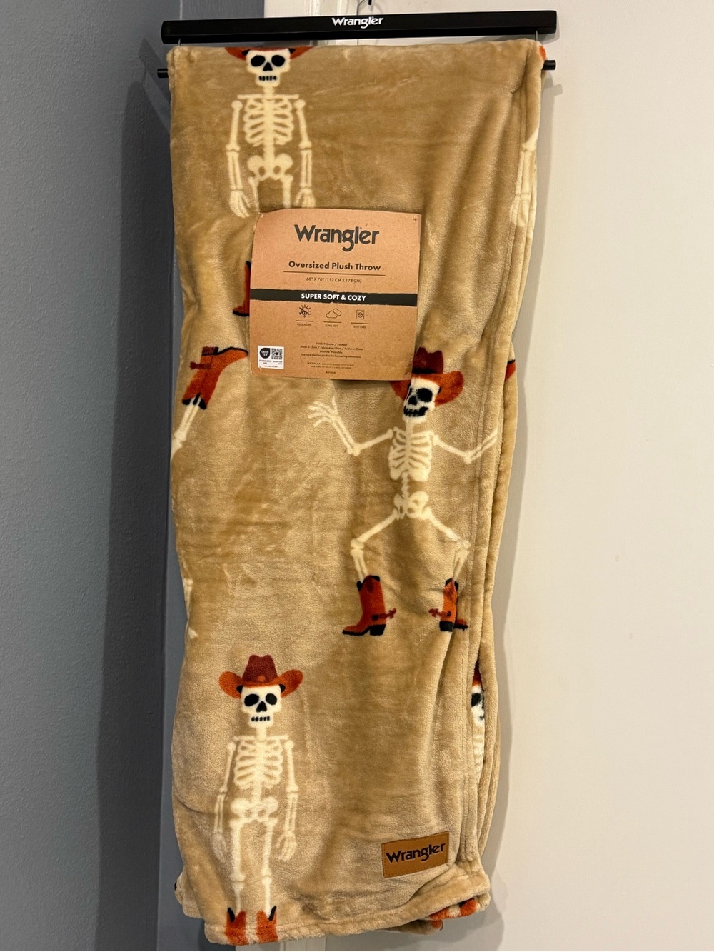 Wrangler Tan Plush Throw with Cowboy Skeleton Motif